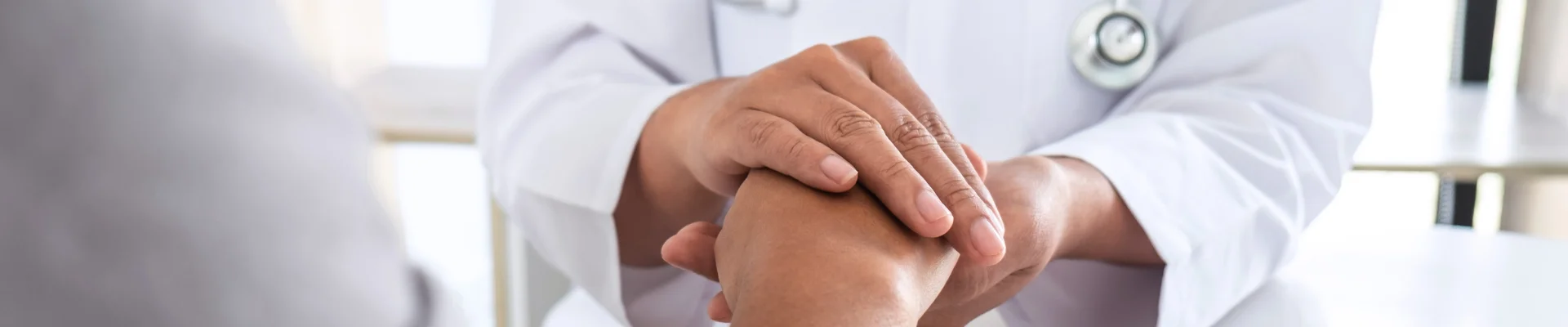 Doctor performs health screening to a patient banner